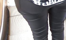 Great ass in shiny leather pants - 24 - close up