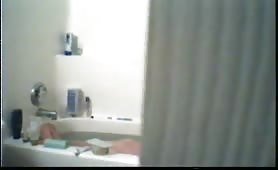 Bad quality shakey cam wife gets out of bath